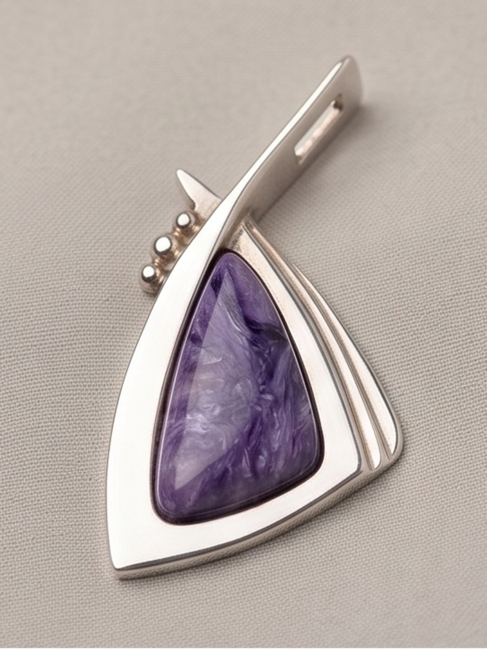 Crafted in 925 sterling silver with a vintage charoite cabochon pendant